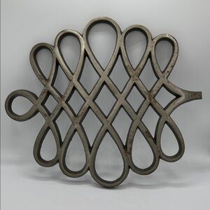 Vintage Dansk cast iron trivet by Jens Quistgaard